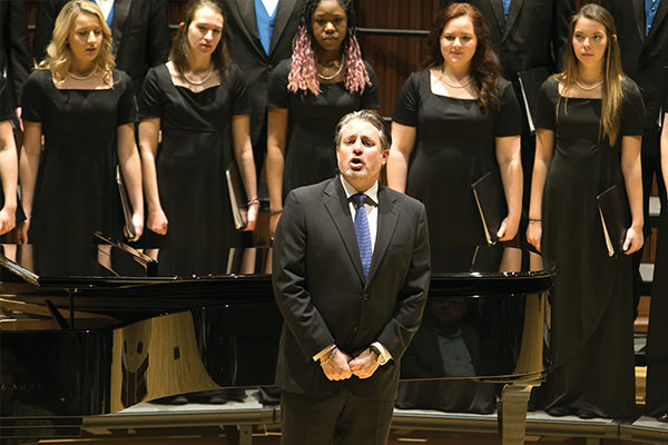 Matthew Polenzani takes the stage with the Assumption Chorale.