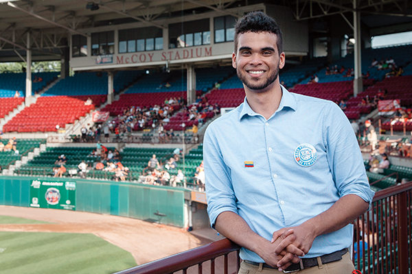 Jean-Manuel Martinez ‘18 embraces his role as organizer of Osos Polares, the Pawtucket Red Sox's initiative to attract more fans from the Latino community.