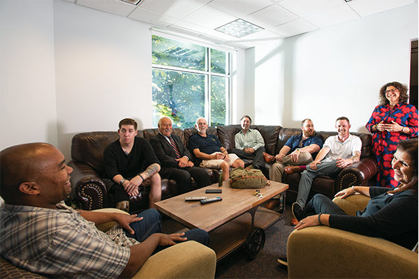 Assumption student and alumni Veterans and members of the Veterans Committee relax in the new Veteransʼ Lounge.